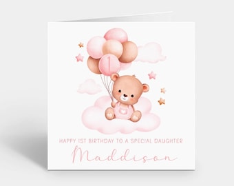 May include: A square greeting card featuring a watercolor illustration of a brown teddy bear sitting on a pink cloud, holding a bunch of pink balloons with the number 1. Text reads: HAPPY 1ST BIRTHDAY TO A SPECIAL DAUGHTER and Maddison.
