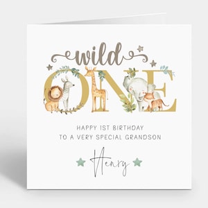 May include: A square greeting card featuring the text "wild ONE" in gold and brown lettering. The design includes watercolour illustrations of a lion, zebra, giraffe, elephant, and tiger. Below, the text reads "HAPPY 1ST BIRTHDAY TO A VERY SPECIAL GRANDSON" and "Henry" with two stars.