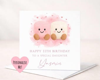 May include: A square greeting card featuring a watercolor illustration of two smiling marshmallow characters, one pink and one white, on a pink cloud background. The text reads: HAPPY 11TH BIRTHDAY TO A SPECIAL DAUGHTER and the name Yasmin.