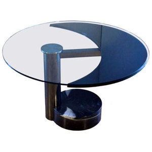 Pierre Cardin Glass Swivel Top Crescent Mezzaluna Dining Table | French Postmodern | 1980s