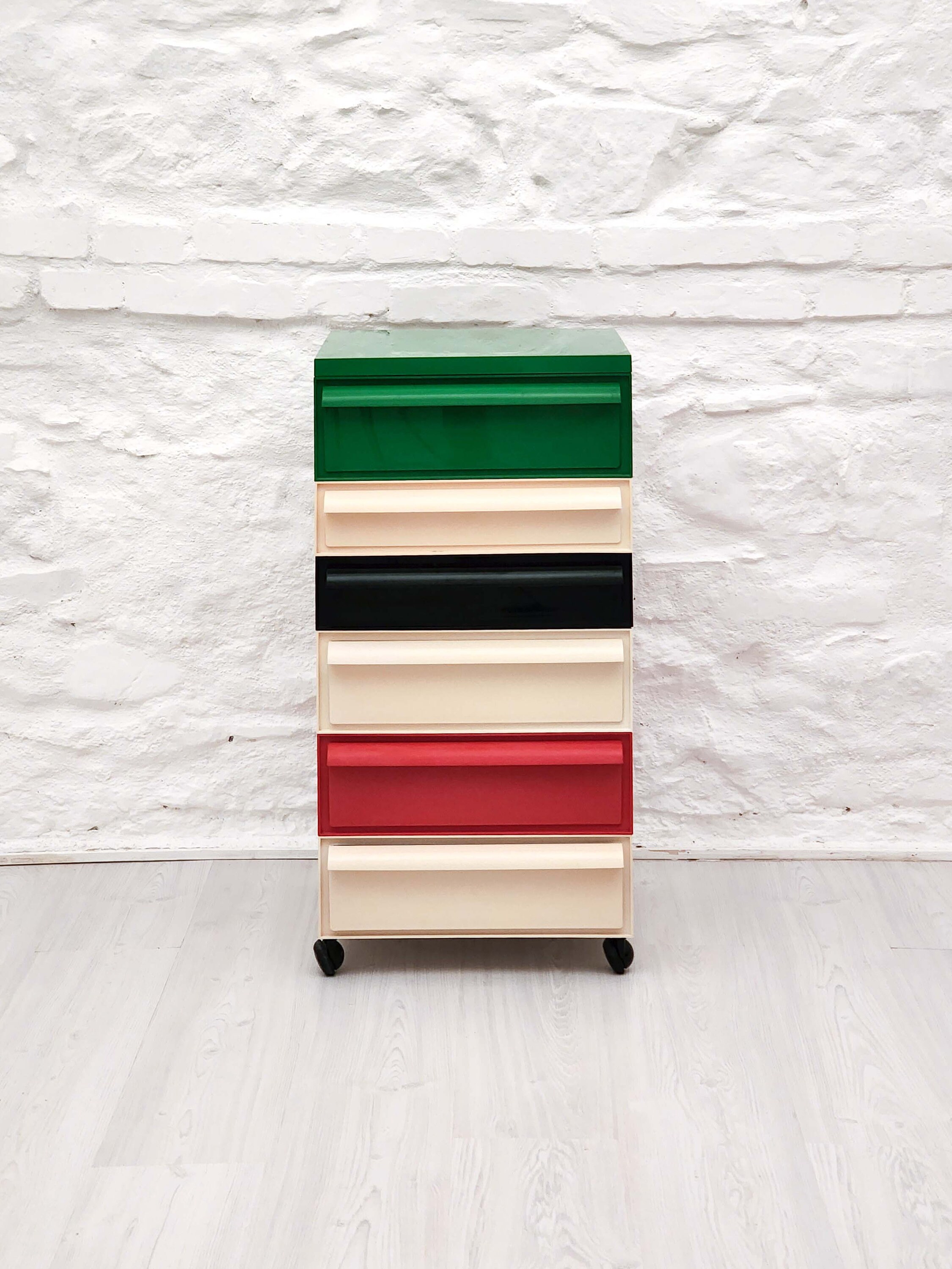 Plastic stacking drawers in red white black green by simon fussell