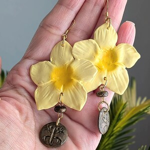 Taino-Inspired Flor de Canario Earrings with Hand-Carved Coqui