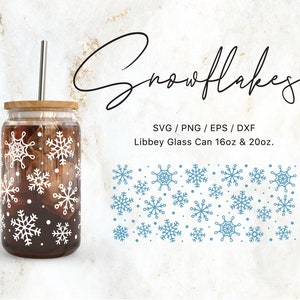 May include: A glass can with a brown liquid and a white snowflake design. The can has a wooden lid and a straw. The text "Snowflakes" is written in cursive above the can. The text "SVG/PNG/EPS/DXF" and "Libbey Glass Can 16oz & 20oz." is written below the can. A row of blue snowflakes is at the bottom of the image.