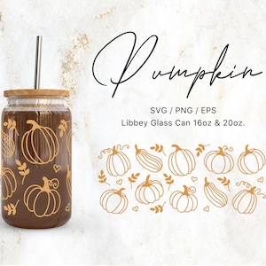 May include: A glass jar with a brown lid and a straw, decorated with a pattern of pumpkins and leaves. The jar is labeled "Pumpkin" and "Libbey Glass Can 16oz & 20oz."