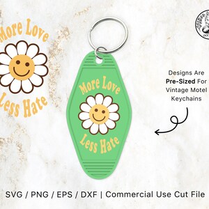 May include: A green vintage motel keychain with a smiling daisy and the text "More Love Less Hate". The keychain is pre-sized for vintage motel keychains.