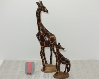 African carved mother and baby Giraffe.