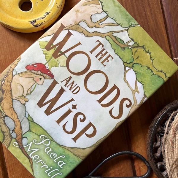 O livro "The Woods and Wisp" de Paola Merrill (capa dura) - Autografado pela autora