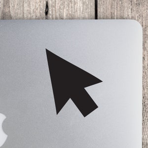 May include: A black computer mouse cursor sticker on a silver laptop.