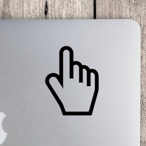 May include: Black and white cursor icon on a silver laptop.