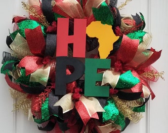 Hope wreath for Black History Month with Pan-African colored glitter ribbon and Africa in wooden sign, Black History Month Decorations