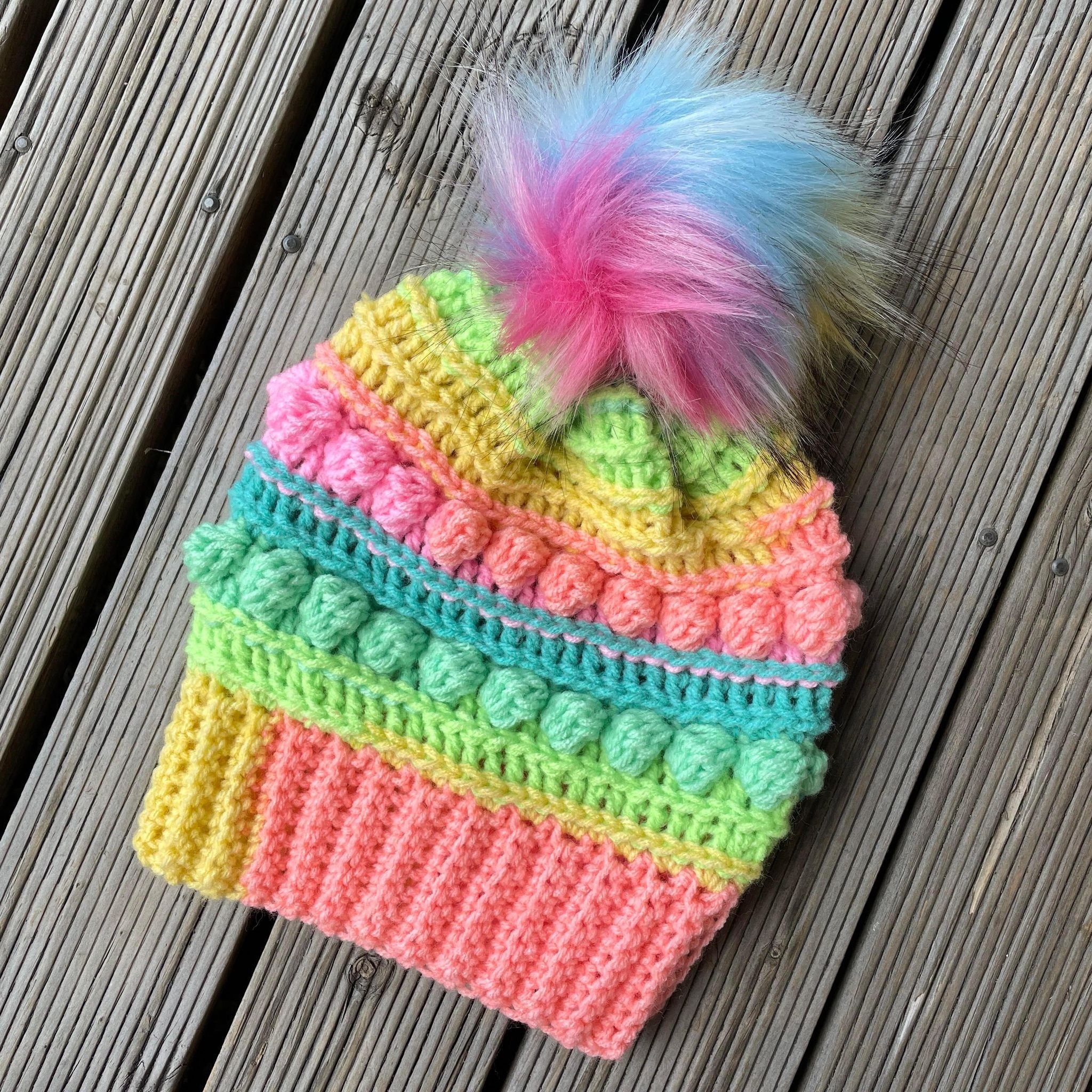 Ravelry: C2C Rainbow Hat with Unicorn Pom Pom pattern by Nicole Riley