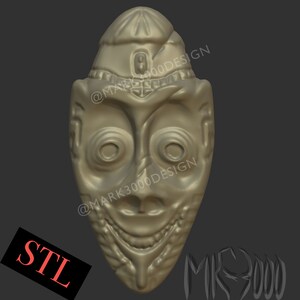 May include: A 3D printed model of a stylized face with a toothy grin. The face has a crown-like headpiece and is detailed with intricate carvings. The model is printed in a light gray color.