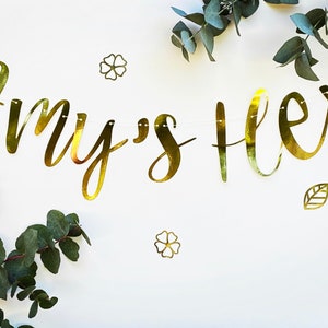 May include: Gold foil banner with the text "Amy's 16" with green eucalyptus leaves and gold foil flowers.