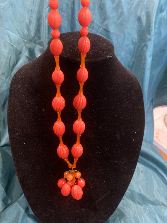 Vintage 50s MCM celluloid orange flapper style ne… - image 2