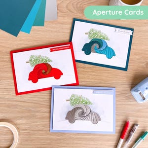 Christmas Car PRINTED Aperture Pack (Pack of 3) | Rectangle White Apertures (x3), Coloured Card Blanks (x3),  C5 White Envelopes (x3)