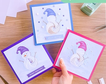 Frosty Snowman Aperture Card (Pack of 3) | White Printed Apertures, Coloured Card Blanks, Envelopes & Iris Folding Pattern