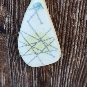 Franciscan Starburst small teardrop pendant