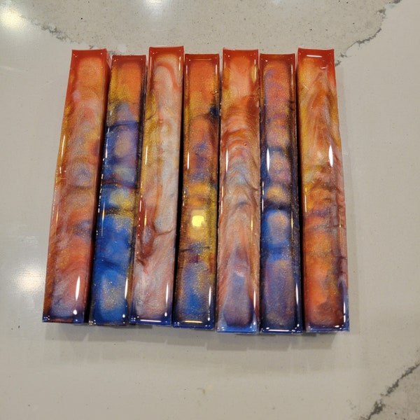 Resin Pen blank, red, blue, gold pigment in a random pattern