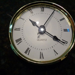 3-1/8&quot;(80MM) Quartz Clock Fit-Up/Insert, Roman Numerals, White Face, Silver Bezel, HMS hands.   Fits hole 2-7/8&quot; to 3-1/16&quot; by 11/16&quot; deep.