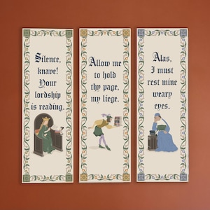 May include: Set of three medieval-themed bookmarks with ornate borders. Each bookmark features a different scene with figures and text: "Silence, knave! Your lordship is reading.", "Allow me to hold thy page, my liege.", and "Alas, I must rest mine weary eyes."