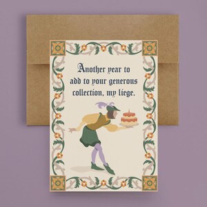 May include: A greeting card with a medieval-style illustration of a person holding a cake. The text reads "Another year to add to your generous collection, my liege."