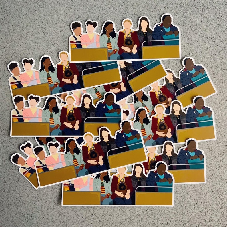 May include: A stack of colorful stickers featuring cartoon characters in various poses. The stickers are arranged in a staggered pattern, with some characters overlapping others. The stickers are all on a gray background.