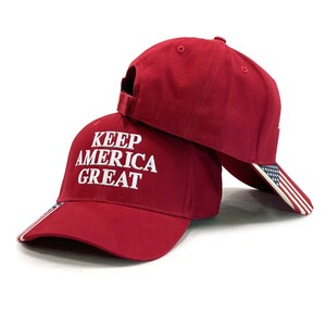 Halten Sie Amerika Große amerikanische Flagge rote Cap
