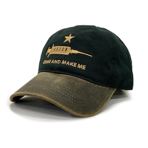 May include: A black and brown baseball cap with a gold embroidered syringe and star, and the text "Come and Make Me".