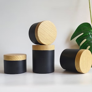 Contenitore per crema cosmetica nero opaco da 5 oz, contenitore per burro di olio di balsamo per il corpo in plastica con venature del legno di bambù, all'ingrosso