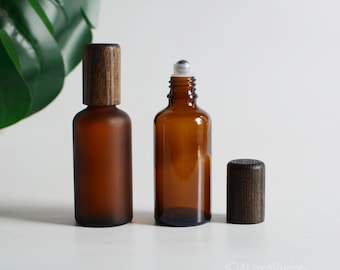 1-200 piezas de 15 ml-100 ml de botellas de vidrio ámbar transparente/esmerilado con rodillo para aceites esenciales de spa, perfumes, madera de bambú negra, bolas de acero, paquete para el cuidado de la piel a granel