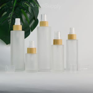 2025 New Fine Mist Spray Bottle 20ml 30ml 50ml 60ml 80ml 100ml 120ml Natural Bamboo Spray Top,Frosted Flat Shoulder Mist Perfume Custom Logo