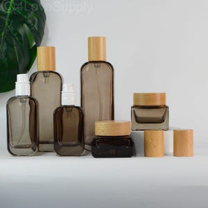 20ml 30ml 50ml 100ml 120ml Natural Cosmetic Sets Really Bamboo Cap ,Clear Coffe Color Square Glass Pump Lotion Bottle/Cream Jars Custom Logo
