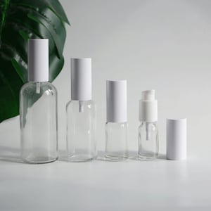 1-200 pezzi 15 ml 30 ml 50 ml 100 ml bottiglie di lozione bianche trasparenti in vetro trasparente pompa per lozione bianca testa imballaggio per la cura della pelle all'ingrosso