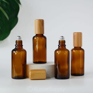 15ml-100ml Natural Roller On Bottles Clear Amber Glass Boston Bottle For Essential Oil Roller Natural Bamboo Cover Stainless Ball Wholesale