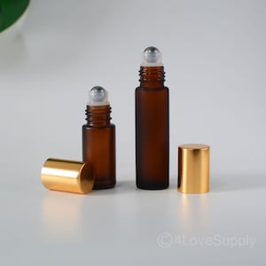 1/200pcs 5ml 10ml Luxury Roller Bottle Gold Cap Stainless Ball Frosted Amber Glass Lip Gloss Oil Skin Care Packaging Essential Perfume Tubes