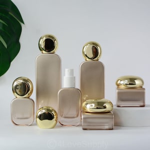 1-200pcs Conjuntos de embalagens cosméticas vazias Spray/Loção/Creme Jar Gradiente Ouro Vidro para cuidados com a pele Recipiente de óleo essencial Névoa fina/Óleo de bálsamo