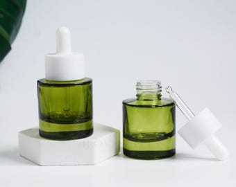 Druppelflesje van 30 ml (1 oz) van heldergroen glas met witte dop, nieuw voor cosmetische verpakkingen van kruidenolie/haarolie/gezichts- en lichaamsverzorgingsproducten, essentiële oliën in bulkverpakking.