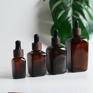 20 ml 30 ml 50 ml 100 ml Druppelflessen Amber Vierkant Glas Zwart Houten Drukdop Retro Etherische Olie Container Huidverzorging Verpakking Bulk