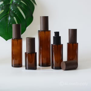 Flaconi da viaggio in vetro ambrato da 20 ml-100 ml, a prova di perdite, con pompa, erogatore di sapone, contenitore per lozione, crema, shampoo, miscele di oli essenziali neri, logo personalizzato