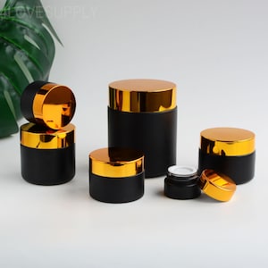 5g 15g 30g 50g 100g Cremetiegel Luxus Gold Cap Matte Black Glass Foundation Pot Nachfüllbarer Glasbalsamölbehälter Kosmetikverpackung