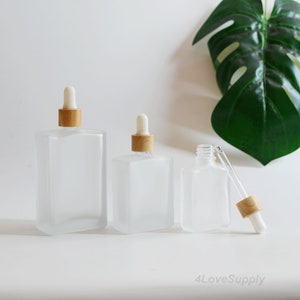 1-200 pezzi 30 ml 50 ml 100 ml flaconi contagocce quadrati in vetro smerigliato effetto legno tappo contenitore per olio essenziale imballaggio cosmetico fai da te logo all'ingrosso