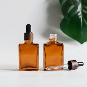 1-200 pezzi 30 ml 1 oz flacone contagocce per siero e lozione ambrato quadrato in vetro tappo effetto legno nero contenitore per olio essenziale personalizzazione ordine all'ingrosso