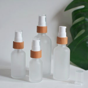 2024 Nuovo 15ml-100ml in vetro smerigliato siero lozione crema gel pompa bottiglia, trattamento pompa bottiglia, imballaggio naturale bambù parte superiore in legno, ordine all'ingrosso