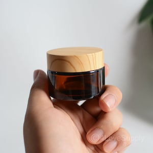 5g 15g 30g 50g Barattolo di crema cosmetica in vetro vuoto Barattolo di crema per il corpo Barattolo di crema per cosmetici Barattoli di vetro ambrato con coperchio in bambù effetto grana all'ingrosso