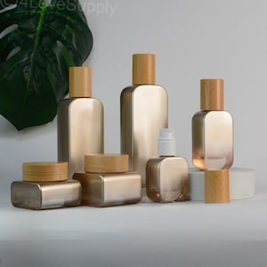20ml 30ml 50ml 100ml 120ml Pump Lotion/Cream Jar Luxury Cosmetic Sets Natural Bamboo Cap Gradient Gold Pump Lotion And Cream Jar,Retails