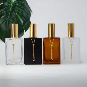 100ml Luxury Fine Mist Spray Bottle,With Gold Chains Perfume Container Elegant Style Square Glass Light Cold Cap Wholesale