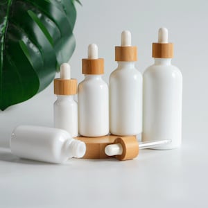 1-200 pezzi flacone contagocce in porcellana bianca tappo in bambù naturale per olio essenziale liquido imballaggio per la cura della pelle bellezza trucco all'ingrosso