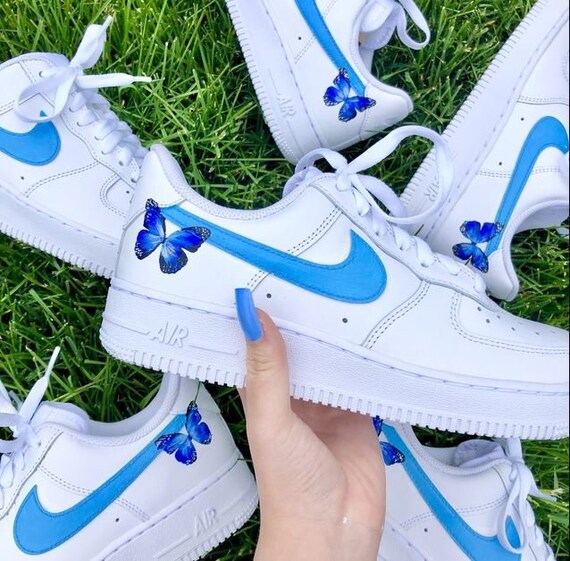 white air forces with blue butterflies