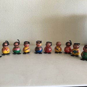 10 miniature wooden figure dolls