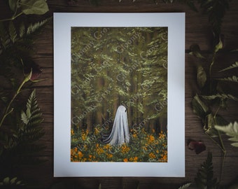 May include: A framed art print featuring a ghostly figure in a forest setting. The artwork depicts a white-sheeted ghost standing among orange flowers, with a backdrop of tall trees. The print is mounted on a white mat, with the text "Gloomy Grove" visible.